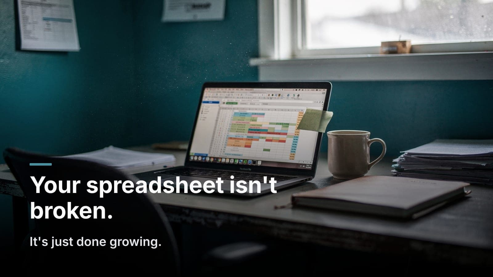 A cluttered spreadsheet with many tabs open on a laptop screen at a small business desk